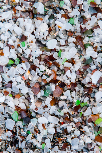 Full frame image of sea glass on a beach photo