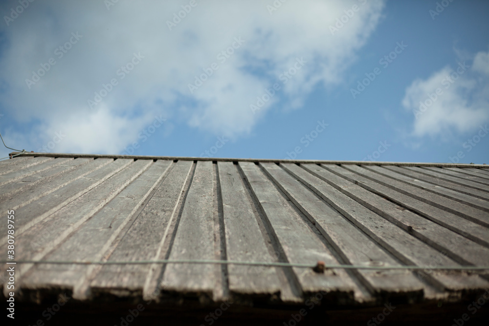 Roof slope. Roof surface against the sky. 