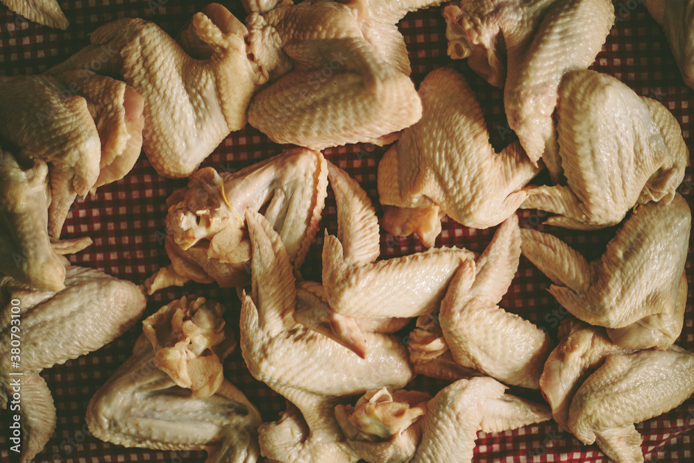 Raw chicken wings on the table. Raw chicken wings on the table.