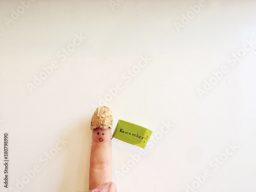 silly finger with peanut hat with sign to Remember