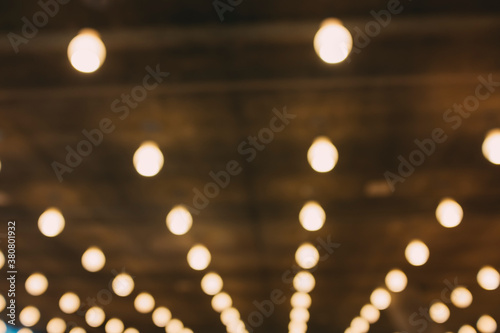 Rows of lights in modern building, blurred focus