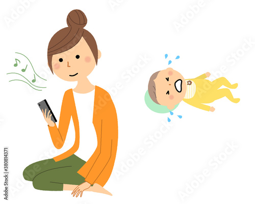 育児放棄をしてスマートフォンを見る若い女性