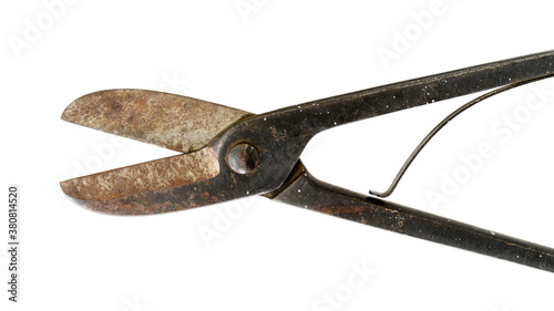 Old tin snips isolated on white
