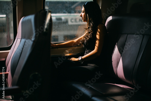 Woman on a train trip