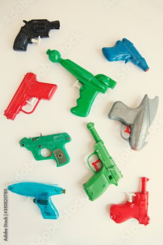 A collection of vintage toy squirt guns / water pistols