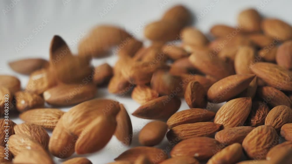 Almonds rotation on the white background - falling -2