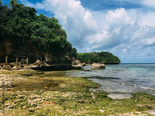 A rocky coast in a beautiful sunny day photo