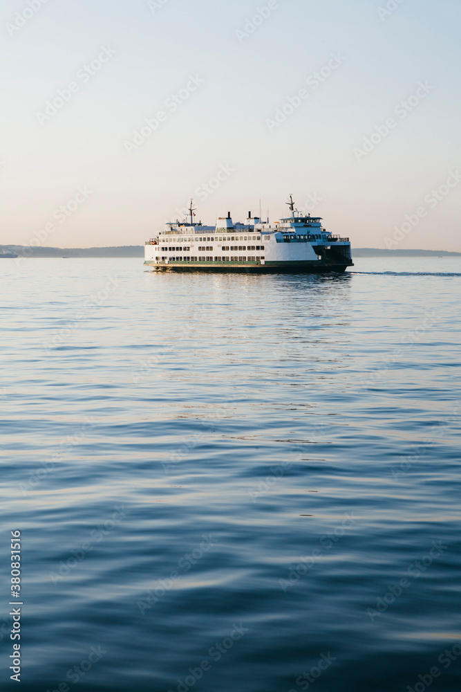 Washington State ferry boat on calm waters of Puget Sound at dusk Washington State ferry boat on calm waters of Puget Sound at dusk