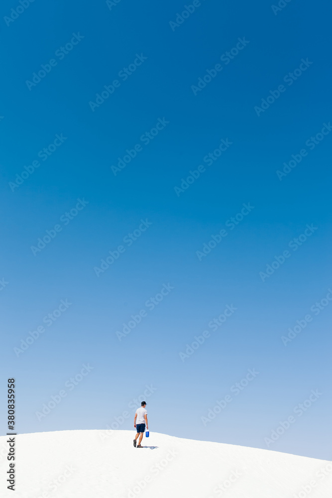 Man walking alone in the desert Man walking alone in the desert