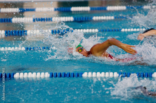Young woman taking breath during freestyle competition