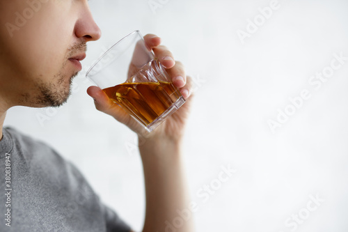 person with a glass of beer