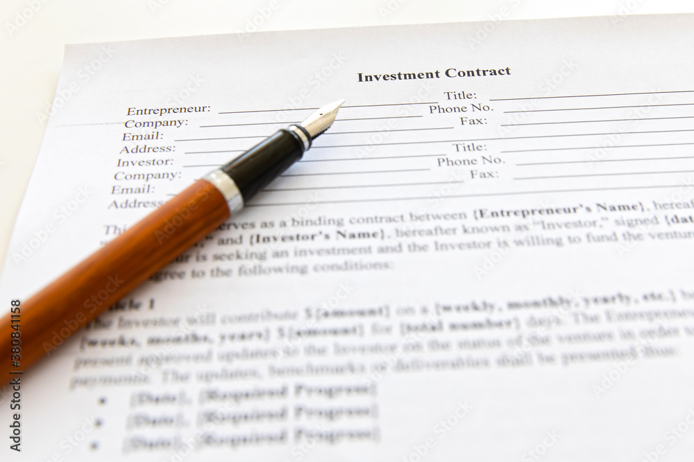 Closeup of contract and pen.