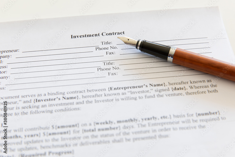 Closeup of contract and pen.
