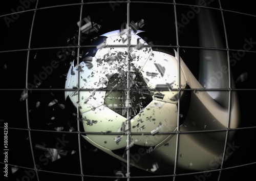 ゴールネットに突き刺さるサッカーボール