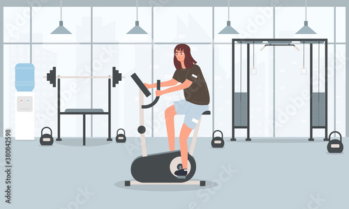 Young fit pretty girl training on an exercise bike. Flat vector illustration. Sport and healthy lifestye concept