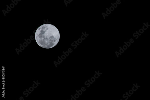 full moon over black