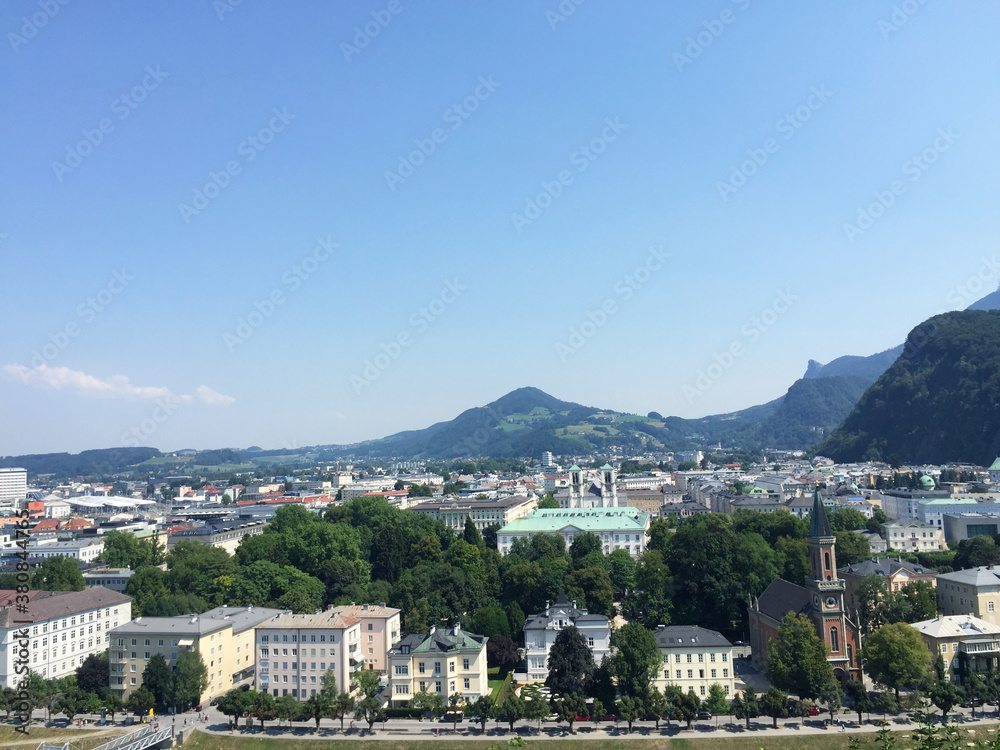 Obraz premium View of the old town and the Salzach river, seen from mountain in Salzburg, Austria