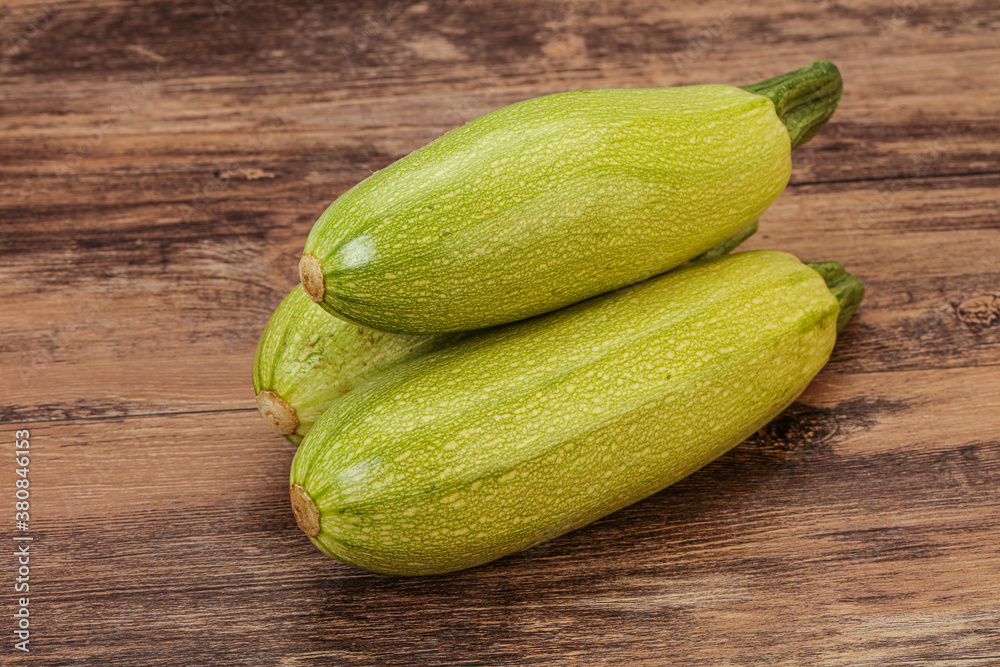 Young tasty zucchini over board Young tasty zucchini over board