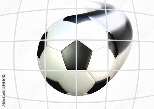 ゴールネットに突き刺さるサッカーボール