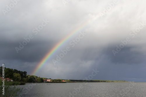 Rainbow over Nida and the Curonian Lagoon photo