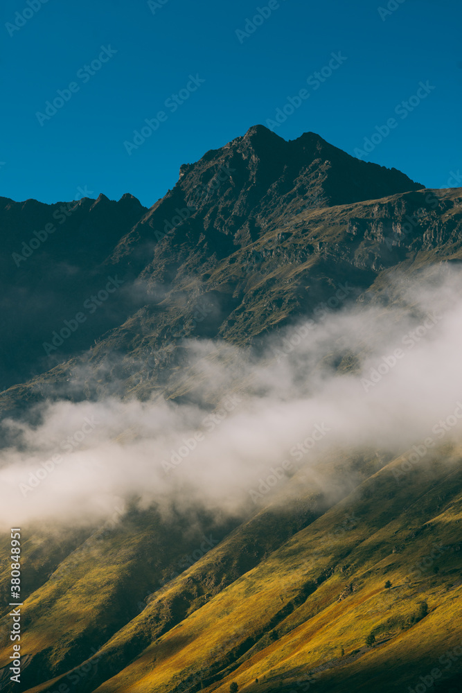 patr of mountains with clouds and shadow patr of mountains with clouds and shadow