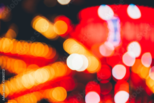 Red blurred lights in a fair
