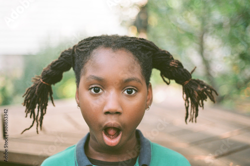 Suprised girl with silly hair