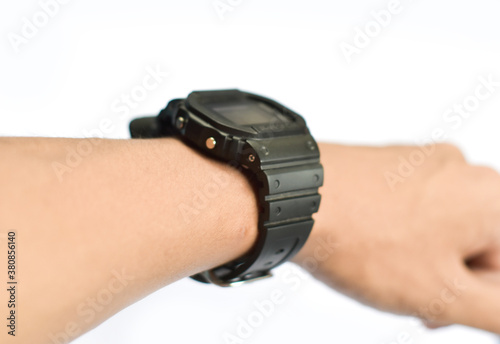 Arm with wrist watch isolated on white background