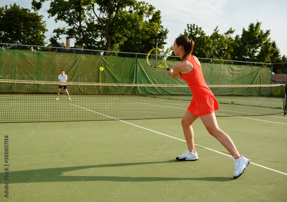 Tennis players, training on outdoor court
