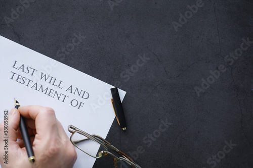 Legal concept. The procedure for writing the last will. Papers with testament on the table. Registration of the last will and testament.