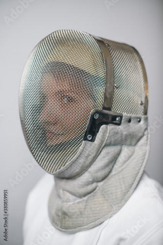 Female fencer wearing mask photo
