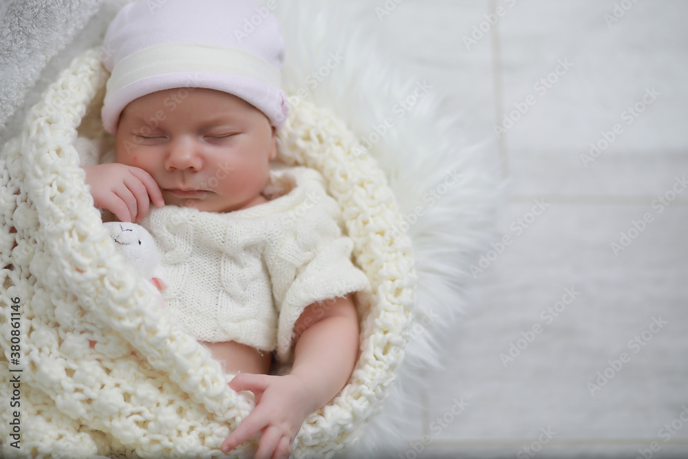 Baby newborn sleeping wrapped up in a blanket Baby newborn sleeping wrapped up in a blanket