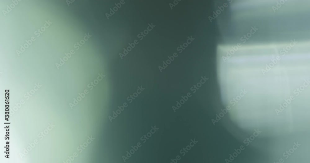 Slow motion real lens flare through glass effects for overlay or transition