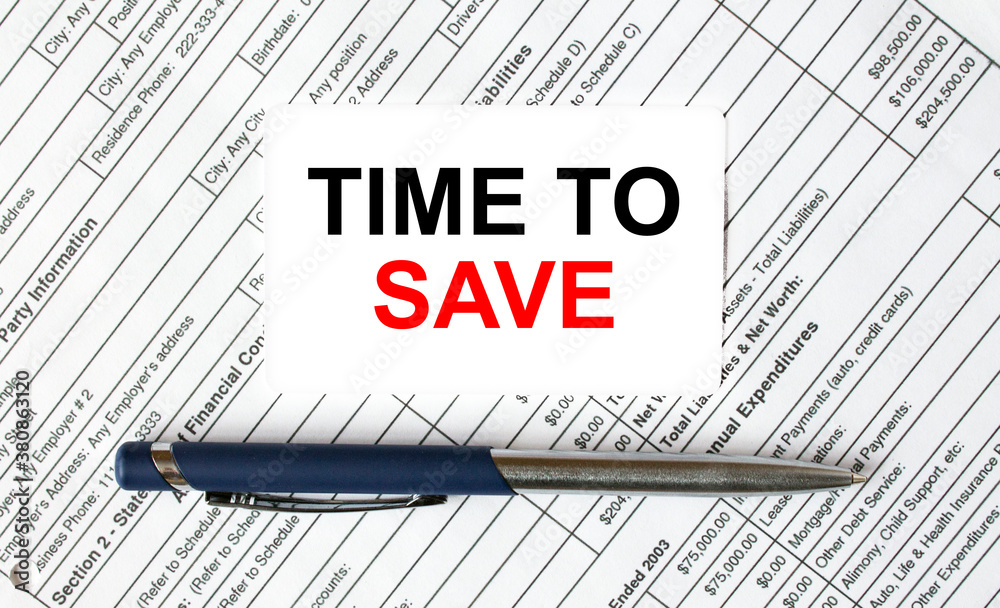 Text Time To Save written on a business card lying on financial tables with a blue metal pen Text Time To Save written on a business card lying on financial tables with a blue metal pen