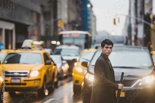 Wallpaper Mural Young man commuting in the city Torontodigital.ca