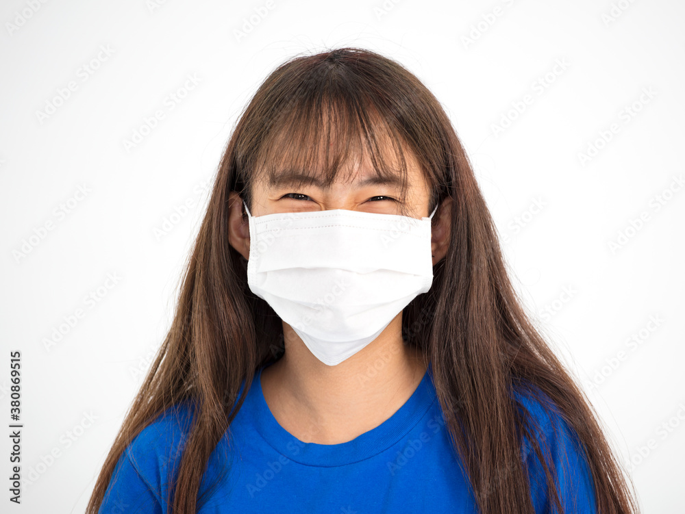 teenager Asian girl smiling and wearing medical mask teenager Asian girl smiling and wearing medical mask