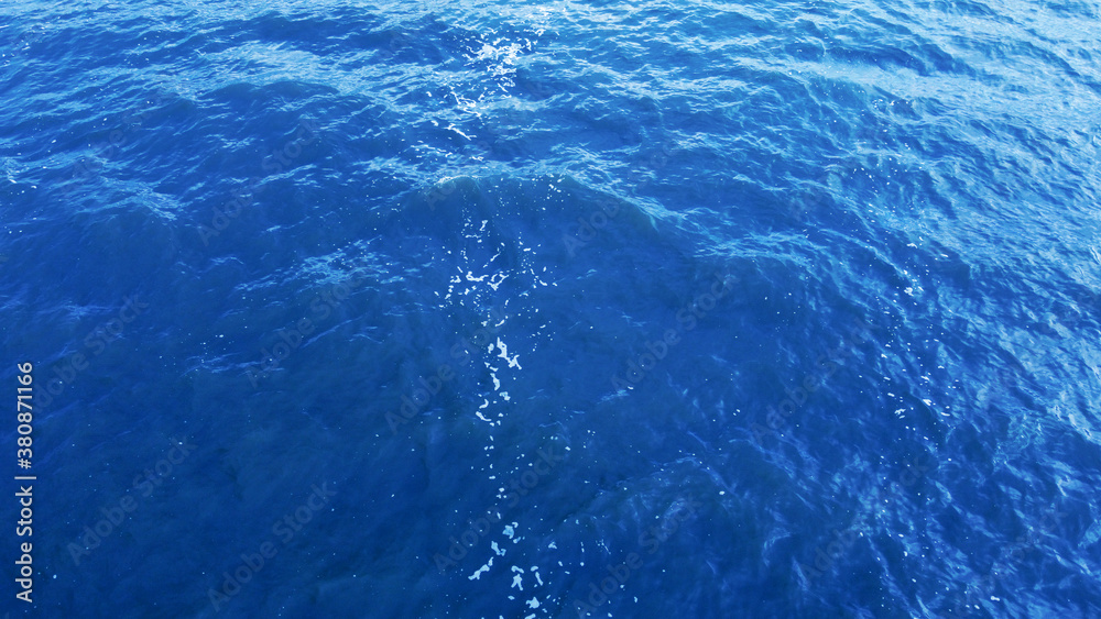 Blue texture of water and waves. Top view of the sea Blue texture of water and waves. Top view of the sea