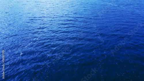 Blue texture of water and waves. Top view of the sea