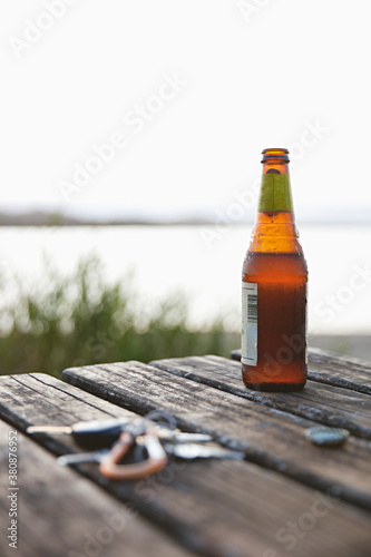 Relaxing at the beach watching the sunset with a cold beer
