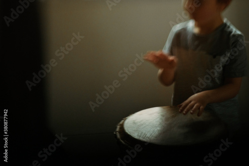 Young child drumming