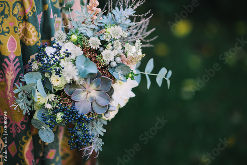 Textural green and white bouquet with succulents photo