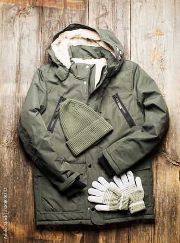 Boy man autumn winter spring clothes set on a natural wooden background. Beauty fashion concept. Flat lay