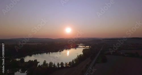 Splendid sunset on lake fly over photo