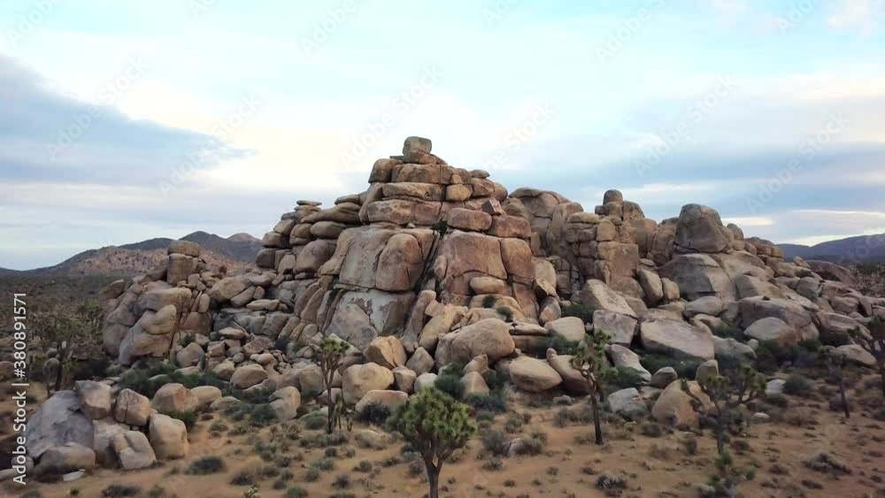 Forward moving drone shot of Joshua Tree rock formation Forward moving drone shot of Joshua Tree rock formation