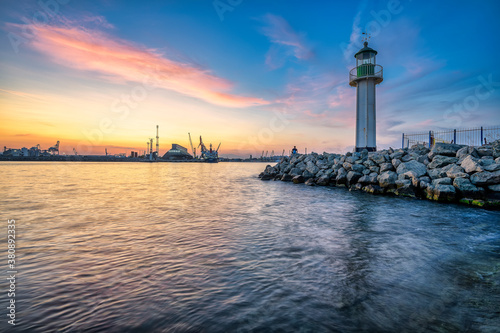 lighthouse on the shore of the sea