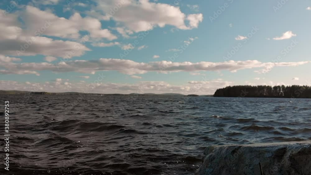 High waves splashing on shore in slowmotion. High waves splashing on shore in slowmotion.
