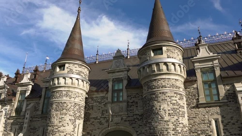 Panning shot of the rebuilt Quebec City Armoury on a sunny day