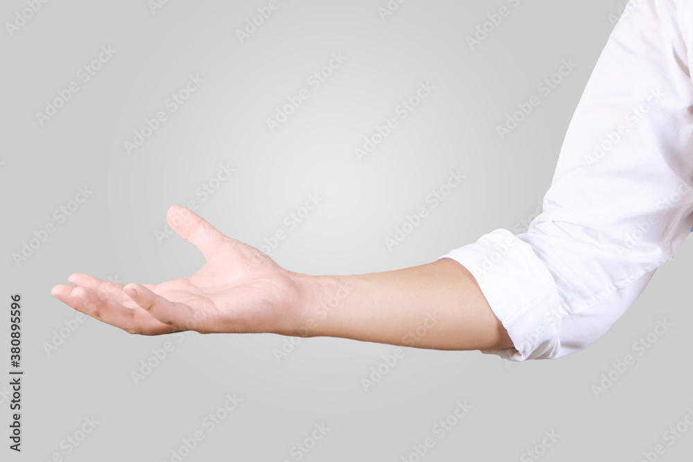 Close-up of businessman's hand holding something with copy space, empty palm up