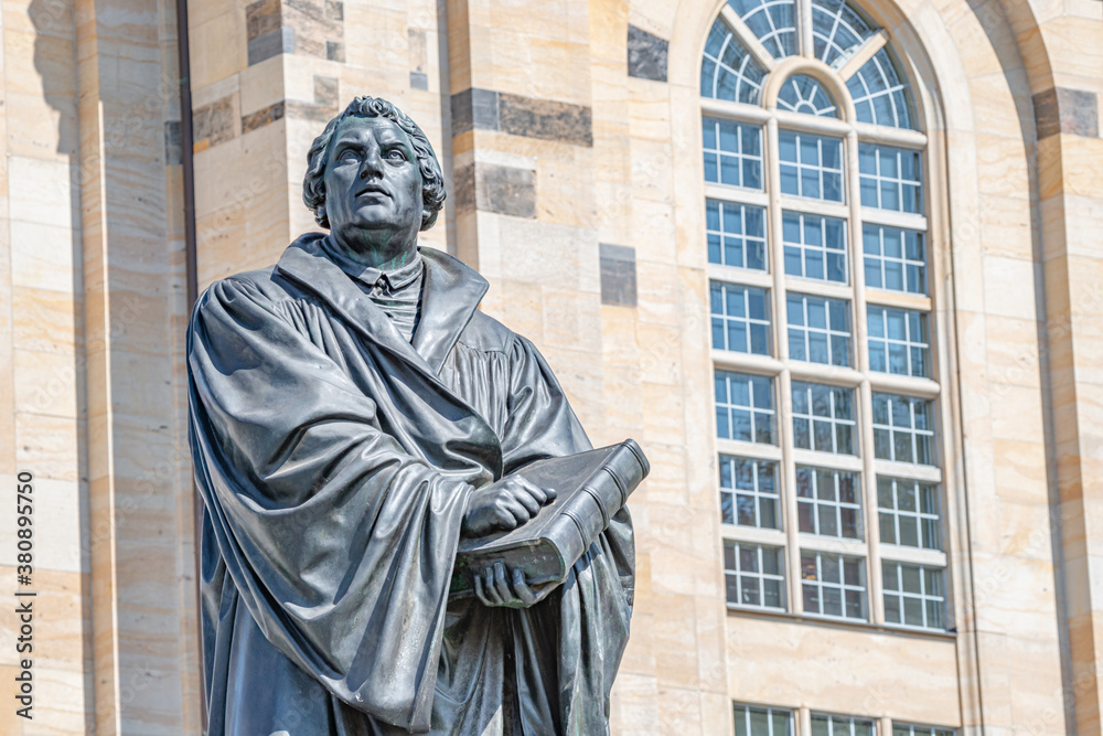 Monument of Martin Luther at  Neumarkt square in downtown of Dresden, a theologist, composer, priest, who has started Reformation in Catholic Church, Germany, details, closeup..