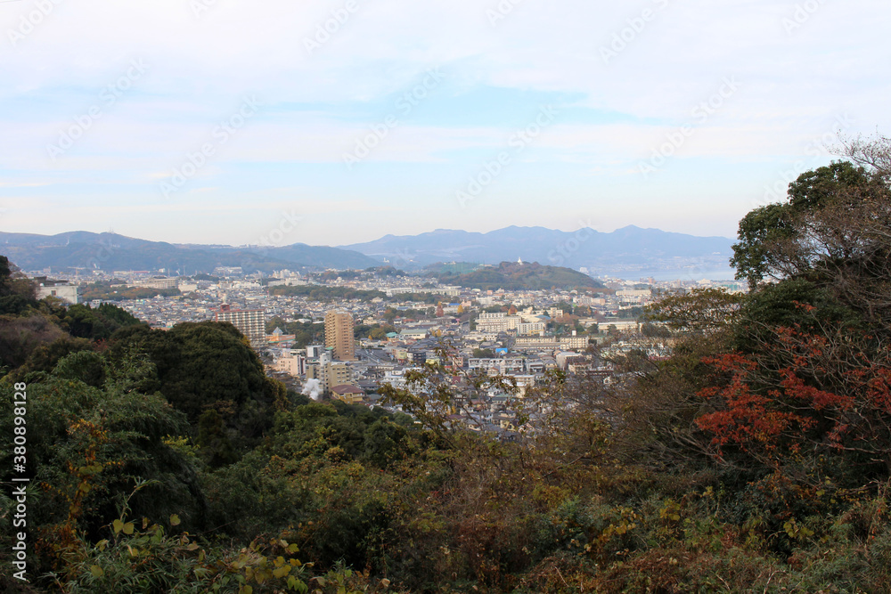 Overlook view of Beppu city with pagoda in Oita